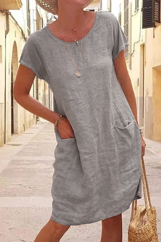New summer loose pure color pocket cotton and linen dress with round collar