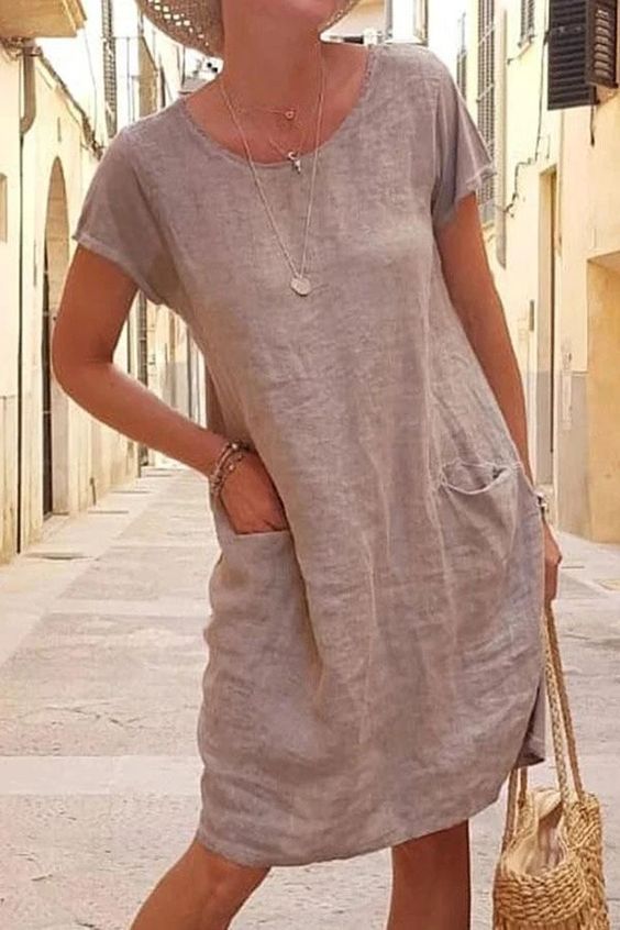 New summer loose pure color pocket cotton and linen dress with round collar